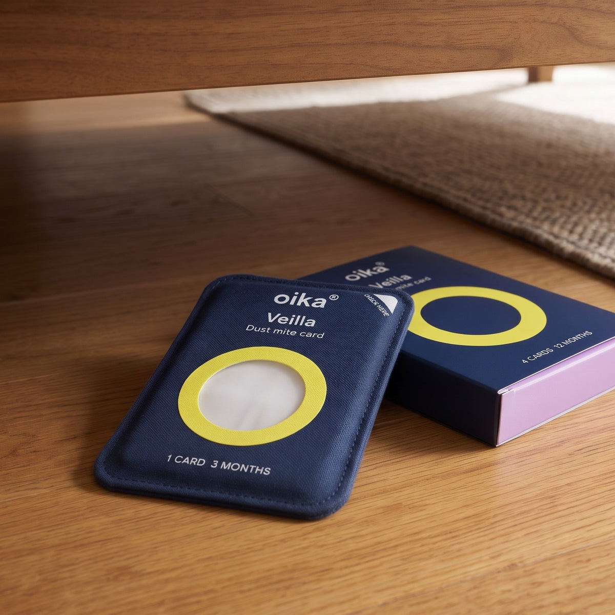 Veilla card and its box of 4 on a wooden floor